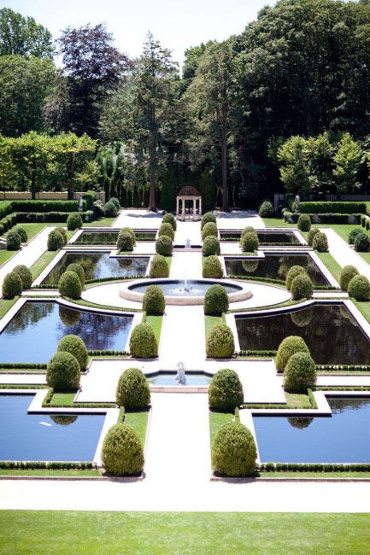 Symmetrical Layout - Formal garden with circular water feature